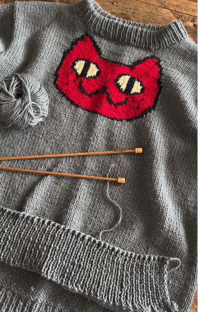 How to lengthen a jumper that has been knitted flat.